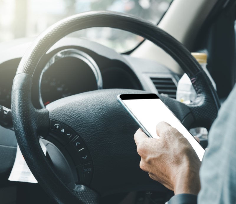 New mobile phone driving law fines drivers £200 for using phone