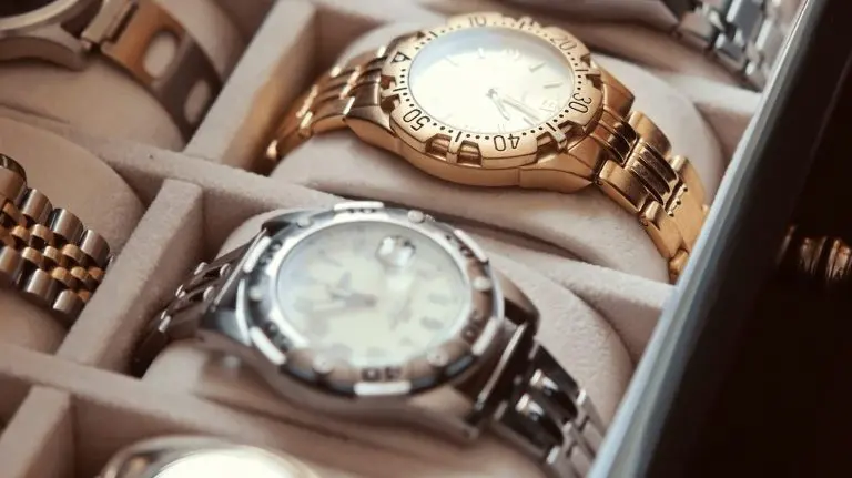 Image of one gold and silver watch in a box