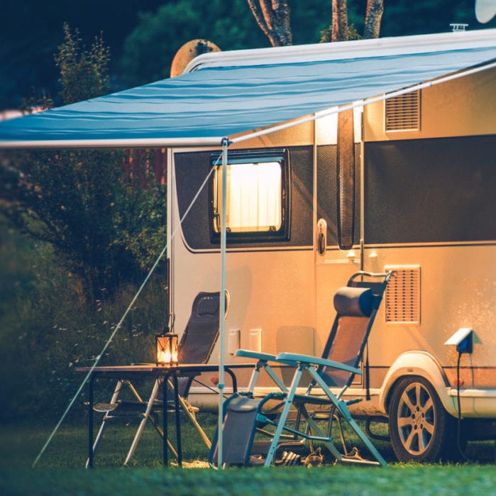 Touring caravan at night - Norton Insurance Brokers