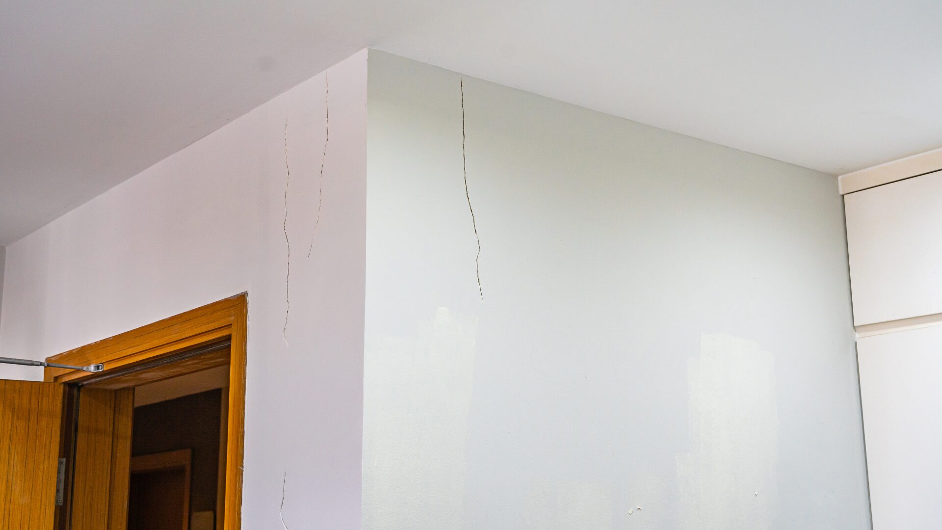 A crack in an interior wall of a holiday home.